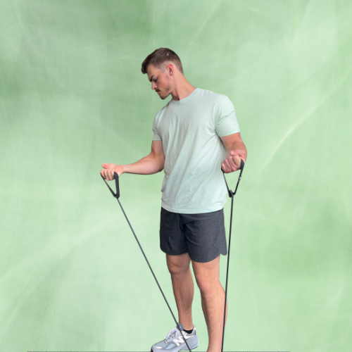 Performing Bicep Curls with sleek, high quality durable resistance bands made in usa